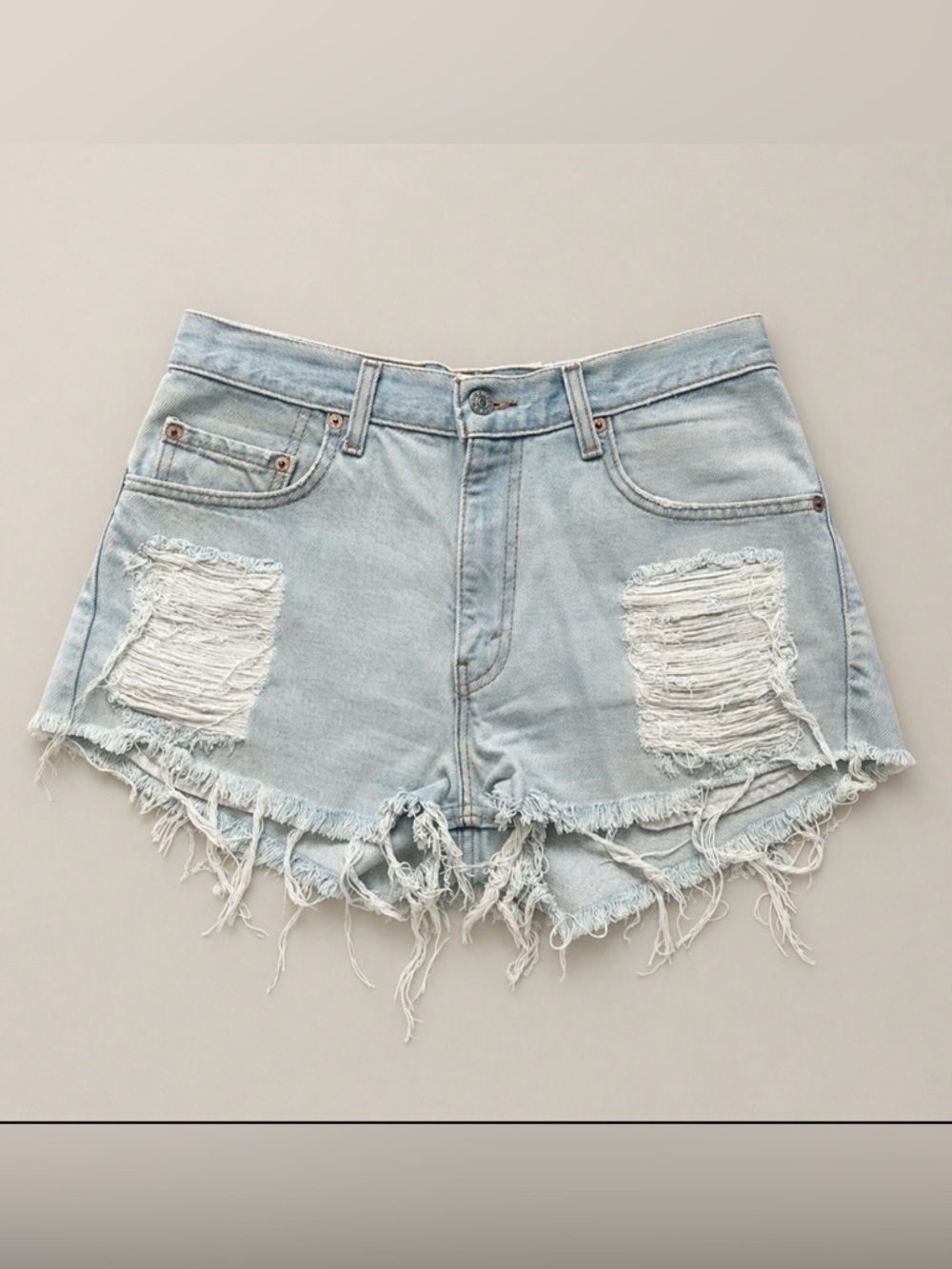 Vintage Levi’s 505 Light Wash Distressed Denim Shorts
